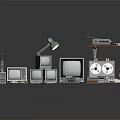 Vintage Electronic Appliances Display With Old Computers Monitors Tape Recorders And Retro Devices