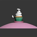 Cupcake With White Whipped Cream Green Liner Pink Base And White Decorative Pieces