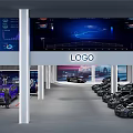 Modern Car Showroom With Two Cars On Platform And Large Background Screen