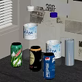 Assorted Beverages Including Biza Bottled Water PEPSI Cans And Canned Drinks On Table
