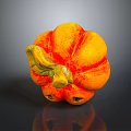 Vibrant Orange And Red Pumpkin With Yellow Stem On Dark Background And Reflection