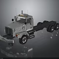 Silver Heavy Duty Truck With Flatbed Chassis Roof Warning Lights Reflective Surface And Multiple Wheels