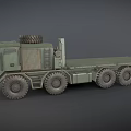 Green Military Truck with Flatbed Trailer Spare Tire on Top and Multiple Large Wheels