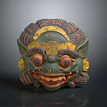 Traditional Green Cultural Mask With Yellow Decorations And Red Eyes Artifact