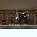 Modern Traditional Tea House Interior With Long Wooden Table Stools And Hanging Lights