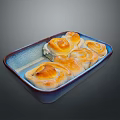Golden Brown Sweet Rolls In Blue And White Baking Dish With Frosting
