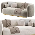 Light Gray Sectional Sofa with Soft Throw Pillows Cozy Blanket and Gold Metal Legs