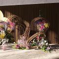 Decorative Scene With Gold Cloud Shaped Decor Colorful Flowers Woven Decorations And Dark Wooden Wall