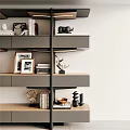 Modern Layered Bookshelf Design With Books Photo Frames And Decorative Sculptures