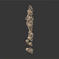 Brown Small Balls And Shell Like Decorations Scattered In Air On White Background