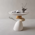 Modern Round Table With Stone Shaped Base White Tabletop Open Book And Vase