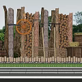 Garden Ornamental Setup With Wooden Stake Wall Wagon Wheel Stacked Firewood And Plants