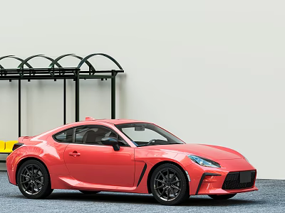 Red Two Door Sports Car With Streamlined Design And Black Wheels Near Shelter 3d model