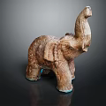 Carved Elephant Sculpture Featuring Intricate Textures Raised Trunk And Artistic Design
