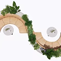 Outdoor Curved Landscape Seating with Lush Green Plants and Round Table