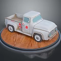 Vintage White Truck Model With Red Cross Symbol On Wooden Base