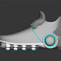 Modern Gray Soccer Shoes With Silver Cleats Blue Accents And Reflective Surface On Black Background
