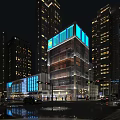 Commercial Street Night Scene Featuring High Rise Buildings Blue Lit Glass Facade Pedestrians And Vehicles