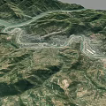 Aerial View Of Mountainous Landscape With Winding River And Village Valley