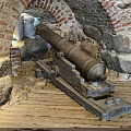 Ancient Cannon In Historical Stone Fortress With Brick Archway Structure