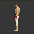 Action Figure Wearing White Karate Uniform With Red Headband Red Wristbands And Black Belt