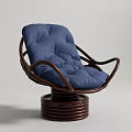Blue Cushioned Leisure Chair With Brown Curved Frame And Round Swivel Base