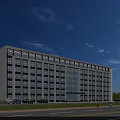 Modern Office Building Exterior With Glass Curtain Wall Large Windows And Front Parking Lot