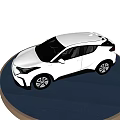 White Modern Car With Sleek Exterior Design And Alloy Wheels On Display Platform
