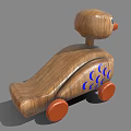 Wooden Toy Duck With Orange Beak Wheels And Blue Fish Scale Design
