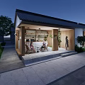 Traditional Style Commercial Street With Wooden Structure Outdoor Seating Greenery And People Relaxing