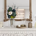 Decorative Ornament Set On White Mantelpiece With Vase Flowers Scented Diffuser And Bear Figurine