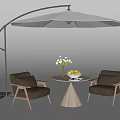 Two Comfortable Lounge Chairs With Round Wooden Table Vase Flowers And Large Cantilever Umbrella