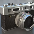 Vintage Yashica Digital Camera With Silver Body And Xenar Lens Design