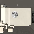 Modern Home Theater Interior with Beige Leather Recliners Circular Moon Decor and Large Screen TV