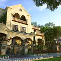 European style Townhouse With Beige Exterior Arched Windows And Wrought Iron Gate