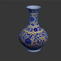 Blue And Gold Decorative Vase With Intricate Floral Patterns On Ceramic Body