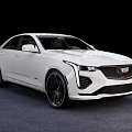 Cadillac White Sedan with Sleek Body Design and Sporty Black Wheels in Studio Lighting Setup