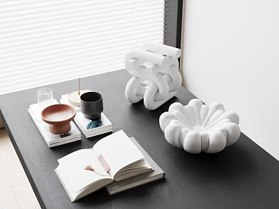 White Inflatable Decorative Ornament On Black Table With Open Book Cups And Books 3d model
