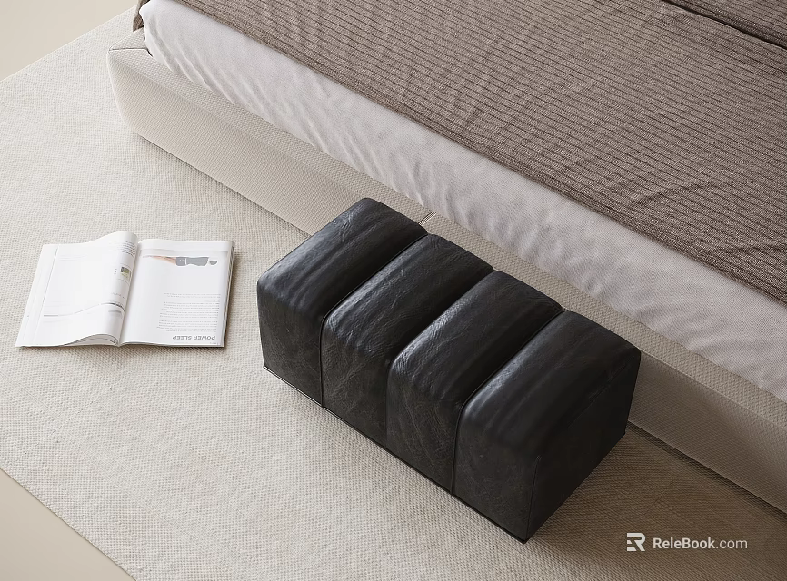 Black Leather Ottoman Placed Beside Bed On Carpet With Open Book 3d model