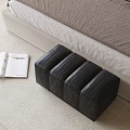Black Leather Ottoman Placed Beside Bed On Carpet With Open Book 3d model