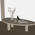 Oval Marble Coffee Table Featuring Vase White Flowers Twigs Black Bird Open Book Glass Cups