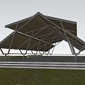 Modern Geometric Wooden Pavilion With Angular Roof Structure Surrounded By Trees And Green Grass