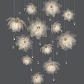Lotus Shaped Crystal Chandeliers With Illuminated Pendants And Elegant Design