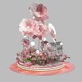 Elegant Floral Installation with Large Pink Paper Flowers and Decorative Base Lighting