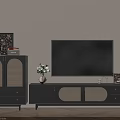Modern Living Room Setup With Black TV Cabinet Grille Door Storage Decorative Items Herringbone Floor