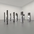Person Pointing At Display Boards With Years And Images In Exhibition Hall