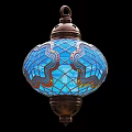 Stained Glass Lantern With Intricate Blue Patterns And Brass Metal Frame