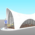 Modern White Curved Station With Large Glass Windows And Outdoor Yellow Chairs