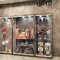 Dolls and Action Figures Collection Showcase in Glass Display Cabinets with Models