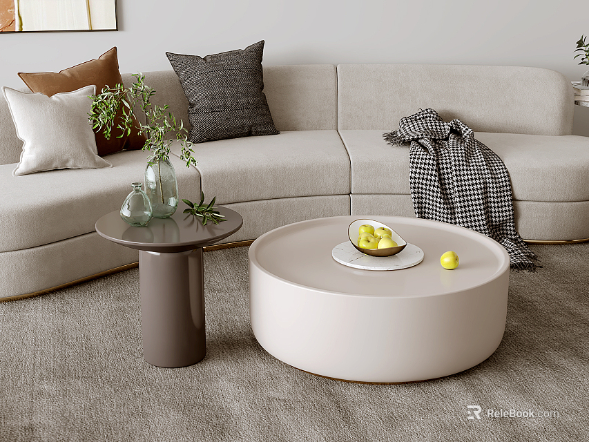 Modern Round White Coffee Table In Living Room With Fruit Plate Lemons Sofa Pillows 3d model 
